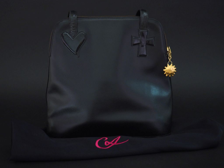 CHRISTIAN LACROIX Sac porté épaule en cuir noir.  Deux anses en cuir v