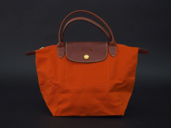 LONGCHAMP,  Petit sac en toile orange, modèle "Le Pliage".