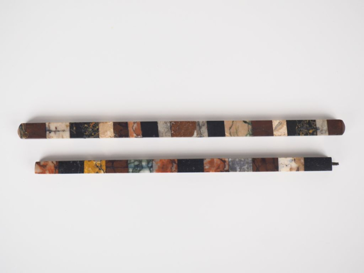 Deux règles XIXème constituées d'éléments de marbres polychromes. L. 2