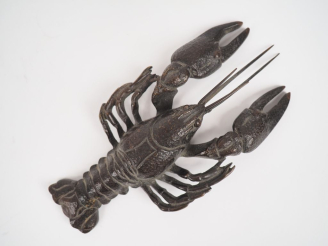 Vente aux enchères Japon fin 1920.  Prise de couvercle en bronze reprenant la forme du ho