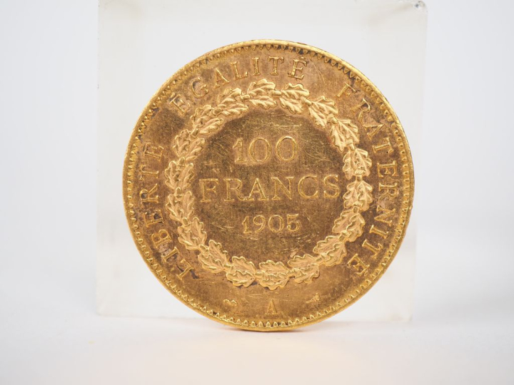 Une pièce de 100 Francs or, 1905-A. FRAIS ACHETEURS 10% HT.   