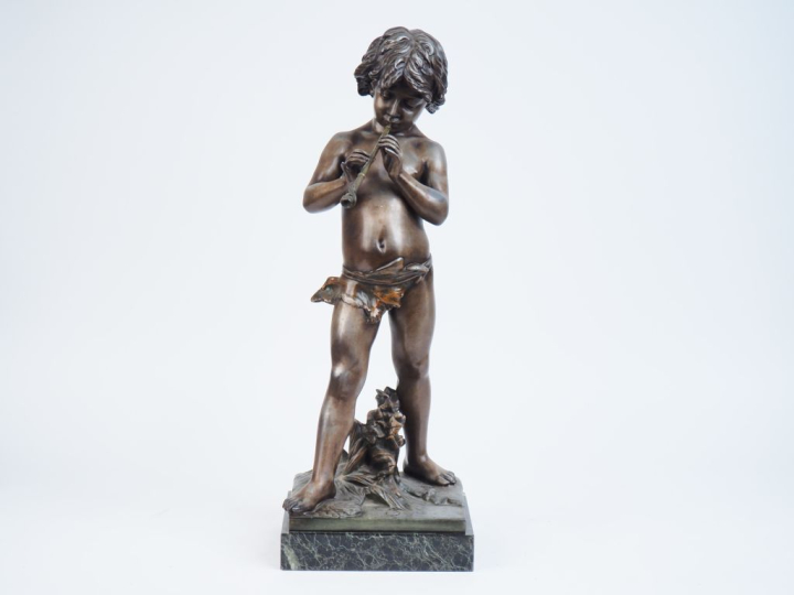 GREGOIRE. "l'enfant charmeur de lézard". Sculpture en régule patiné su