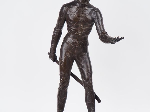WAAGEN.  "Arlequin". Grande sculpture en régule à patine brune. H. 100