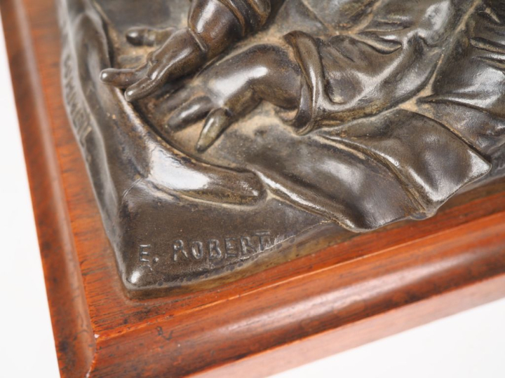 E. ROBERT.  "le sommeil". Sujet en régule à patine brune, socle en aca