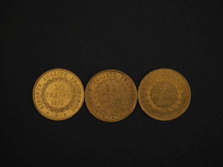 Trois pièces de 20 Francs or, 1875-A (x2) et 1877-A.  FRAIS ACHETEURS 