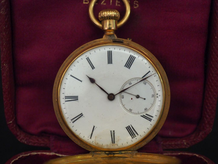 Montre de gousset en or jaune 750. Le couvercle orné de chiffres romai