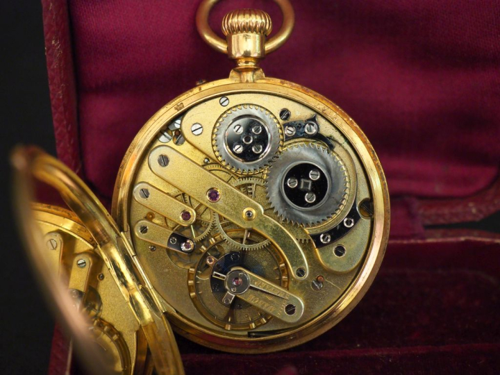 Montre de gousset en or jaune 750. Le couvercle orné de chiffres romai