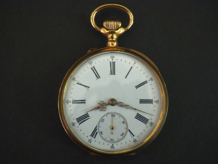 Montre de gousset en or jaune 750.  Cadran émaillé à chiffres romains 