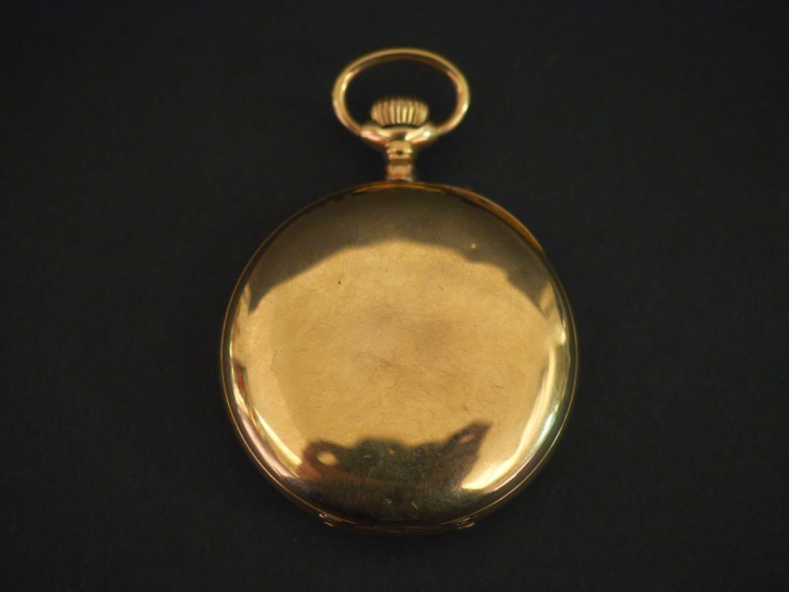 Montre de gousset en or jaune 750.  Cadran émaillé à chiffres romains 