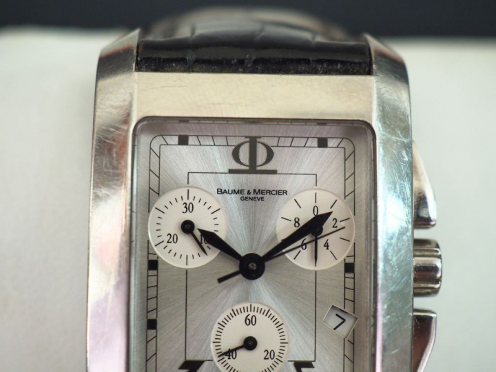 BAUME   MERCIER, Genève Montre bracelet d'homme en acier.  Cadran rect
