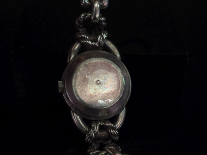 HERMES,  Montre bracelet de dame en argent 925.  Cadran rond à chiffre