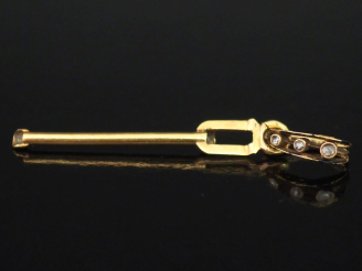 Vente aux enchères Elément de pendentif en or jaune 750, la bélière agrémentée d'un petit