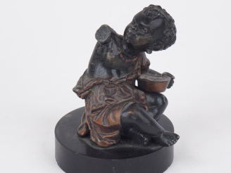 Vente aux enchères Sujet XIXème en plomb polychrome, "jeune nubien" sur un socle en bois 