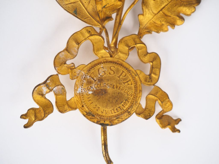 Palme de récompense en métal doré du concours de Verdun juillet 1928. 