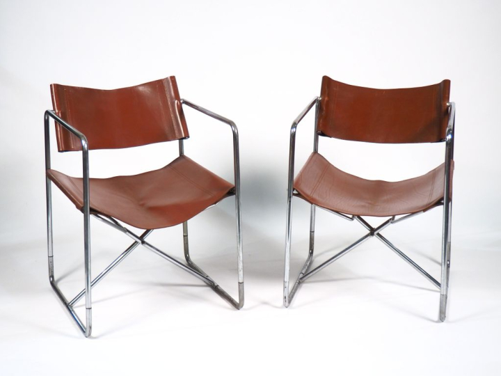 Michel CADESTIN. Paire de fauteuils modèle "Président", structure repl