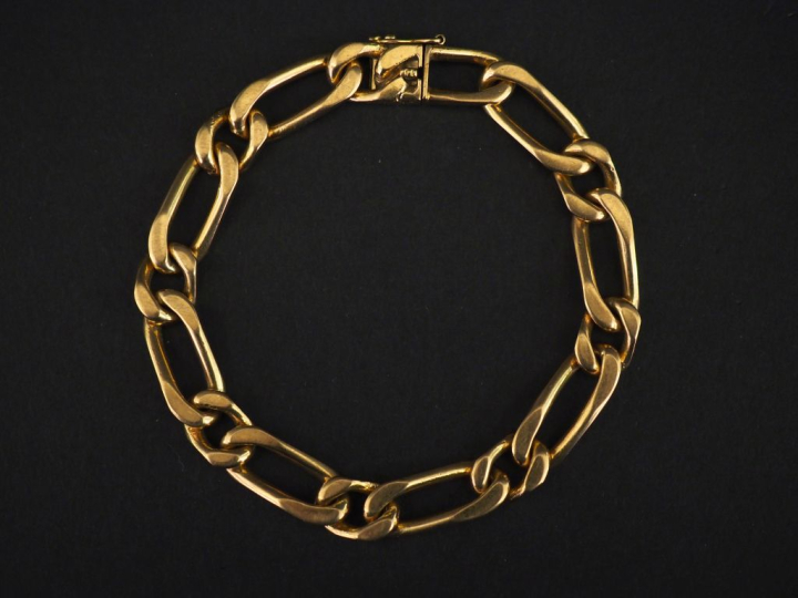 Bracelet souple en or jaune 750, maille gourmette.  Long. 18,8 cm Poid