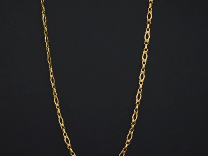Sautoir en or jaune 750, composé de maillons ajourés.  Long. 62,5 cm P