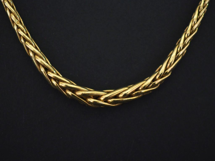 Collier souple en or jaune 750, maille palmier en chute.  Long. 45 cm 