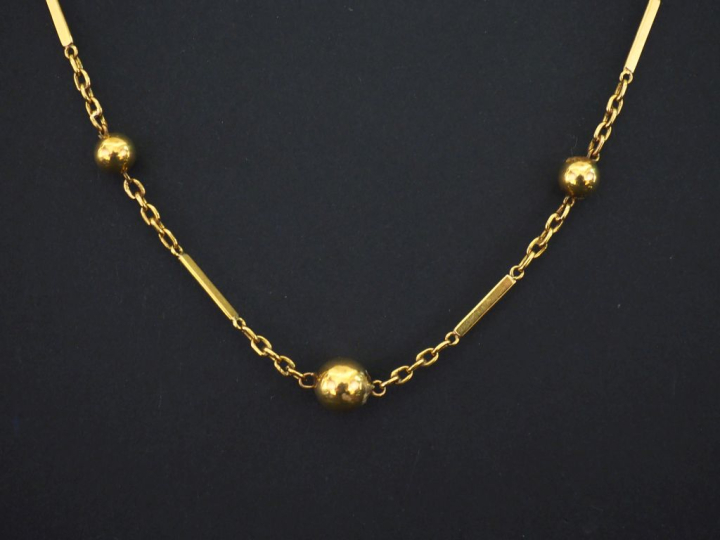 Collier souple en or jaune 750, composé de maillons rectangulaires et 