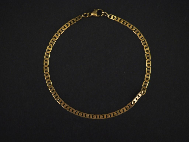 Bracelet souple en or jaune 750, maille plate marine.  Long. 19 cm Poi