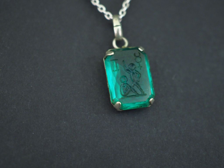 Chaine en argent 835, maille forçat, et un pendentif en métal argenté 