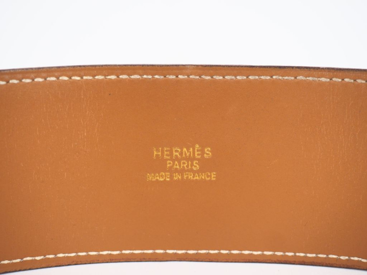 HERMES, Paris Ceinture "Collier de chien" en cuir marron.  Garniture e