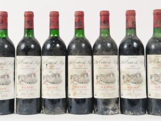 Vente aux enchères 7 BOUTEILLES CHÂTEAU LA TOUR DE BY CB MEDOC - 1987 - BG/BS
