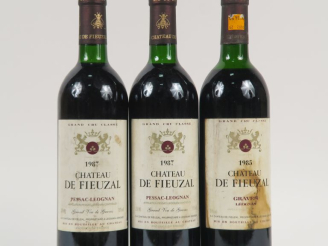 Vente aux enchères 3 BOUTEILLES CHÂTEAU DE FIEUZAL GCC GRAVES - 1 de 1985 HEP/ET - 2 de 1