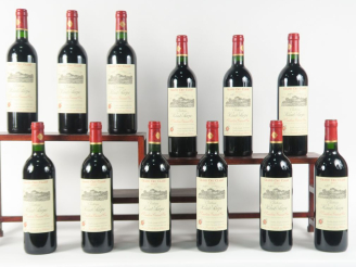 Vente aux enchères 12 BOUTEILLES CHÂTEAU HAUT SARPE GC ST EMILION - 2003 - CBO