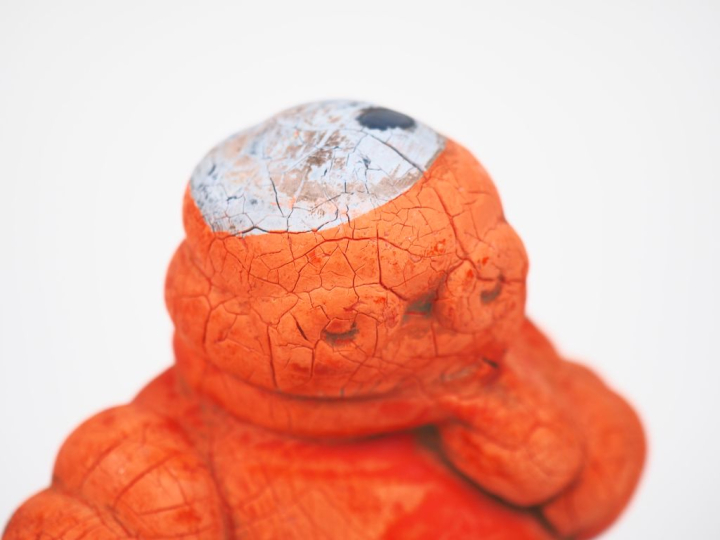 MICHELIN. Bibendum, sujet en caoutchouc rouge circa 1920-1930. (mauvai