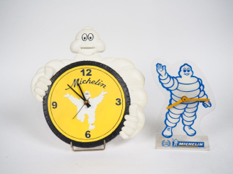 Vente aux enchères MICHELIN.  Deux horloges Bibendum.