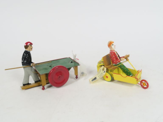 Vente aux enchères Lot de 2 jouets en tôle création des années 2000, Tuches et Wathes Ger