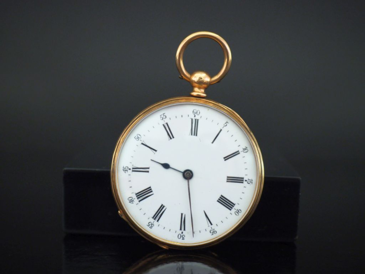 Montre de gousset en or jaune 750. Cadran rond à chiffres romains pour