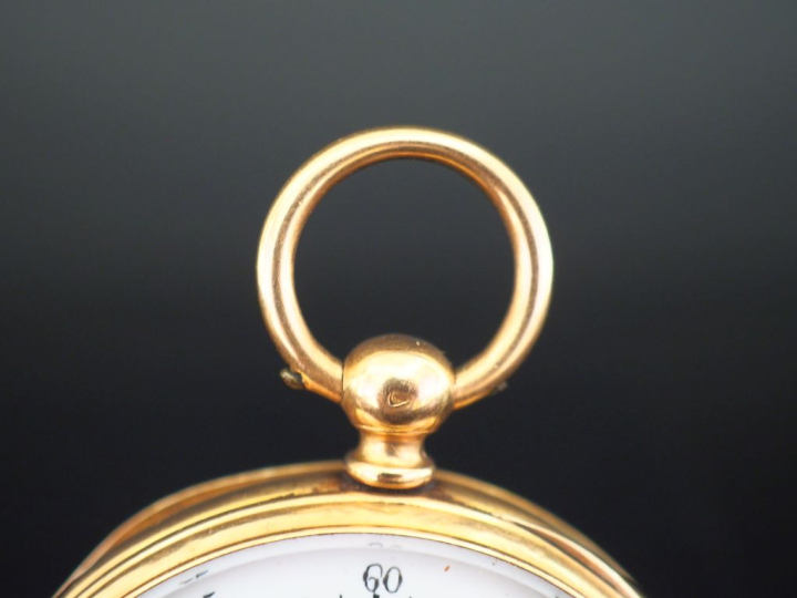 Montre de gousset en or jaune 750. Cadran rond à chiffres romains pour