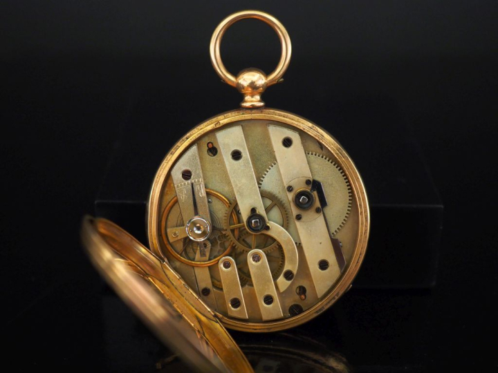 Montre de gousset en or jaune 750. Cadran rond à chiffres romains pour