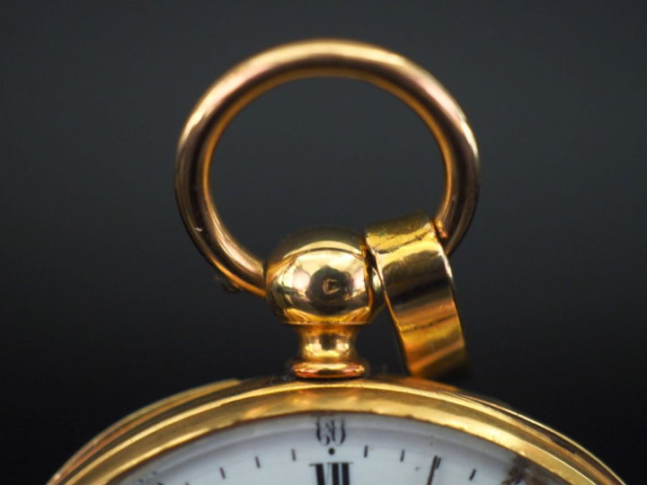 Montre de gousset en or jaune 750.  Cadran émaillé à chiffres romains 