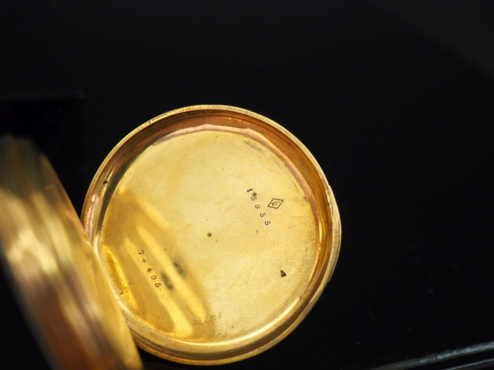 Montre de gousset en or jaune 750.  Cadran émaillé à chiffres romains 