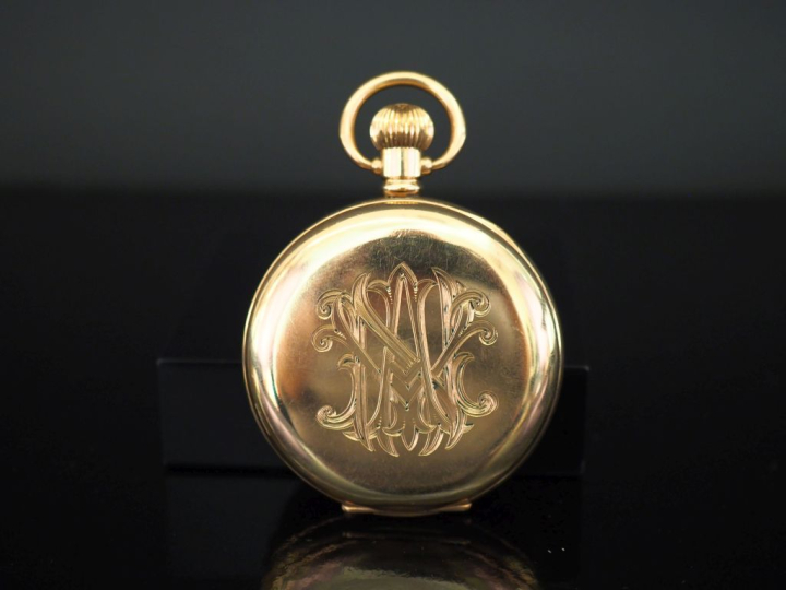 Montre de gousset en plaqué or.  Cadran à chiffres romains pour les he