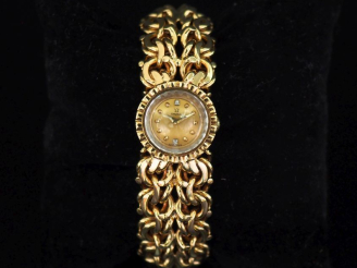 Vente aux enchères OMEGA,  Montre bracelet de dame, boitier et bracelet en or jaune 750. 