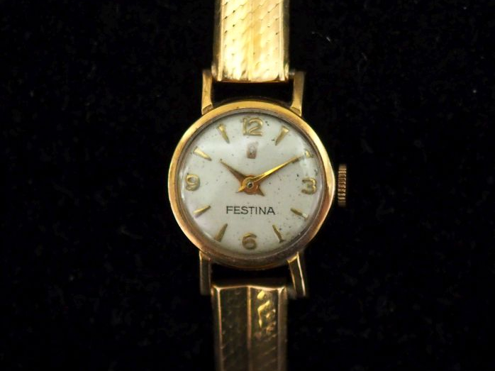 FESTINA Montre bracelet de dame, boitier et bracelet en or jaune 750. 