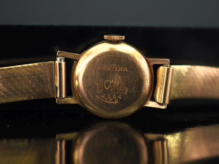 FESTINA Montre bracelet de dame, boitier et bracelet en or jaune 750. 