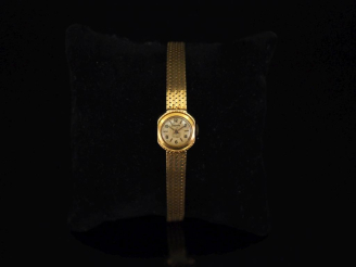 Vente aux enchères LACORDA,  Montre bracelet, boitier et bracelet en or jaune 750.  Cadra