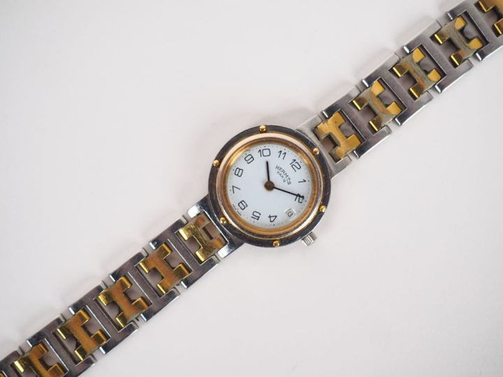 HERMES, Paris Montre bracelet, modèle Clipper, en acier et acier doré.