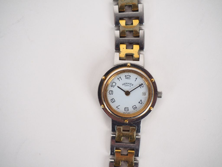 HERMES, Paris Montre bracelet, modèle Clipper, en acier et acier doré.