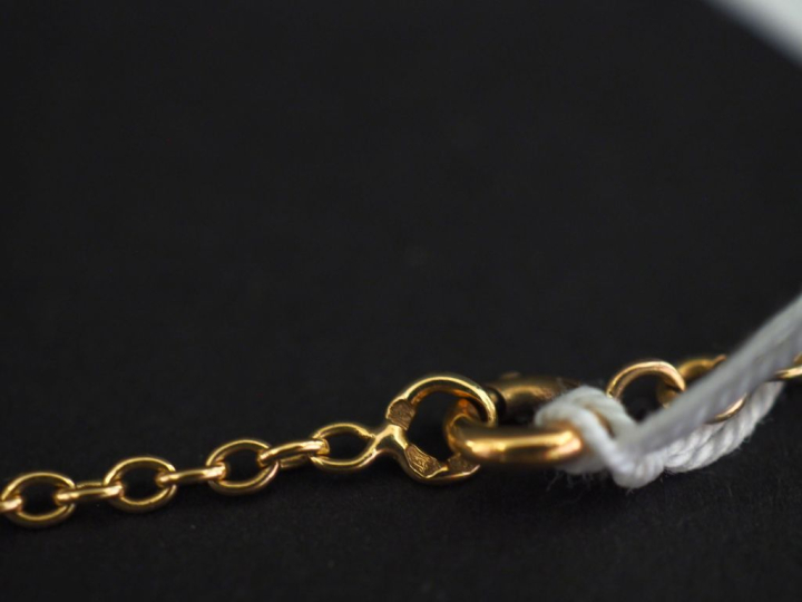 Collier souple en or jaune 750, composé de maillons rectangulaires et 