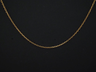 Vente aux enchères Chaine en or jaune 750, maille forçat.  Chainette de sécurité.  Long. 