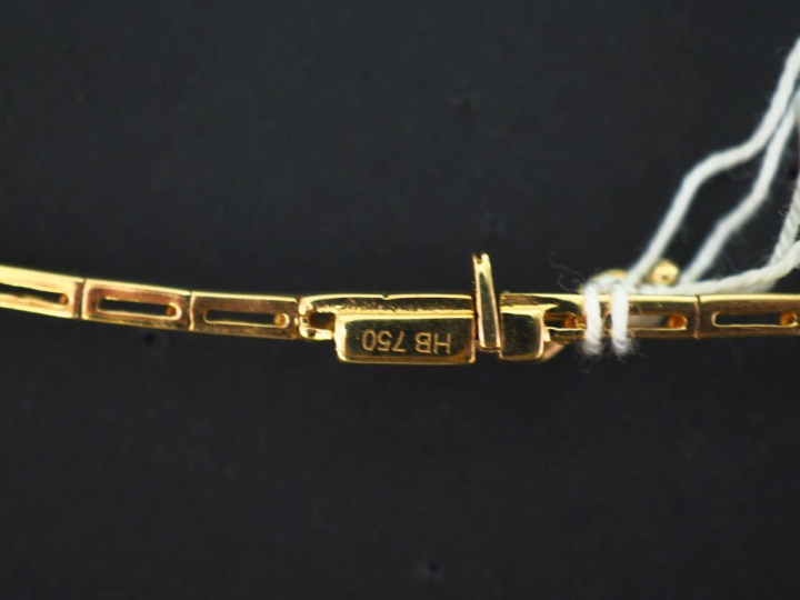 Collier négligé en or jaune et or blanc 750, serti de diamants pour un