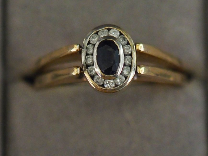 Bague articulée double faces en or jaune 750, sertie d'un côté d'une é