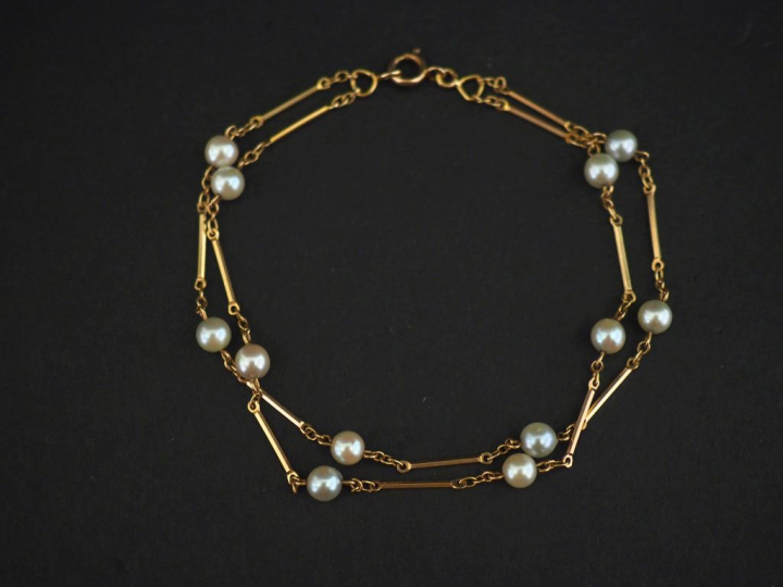 Bracelet souple double rangs en or jaune 750, à décor de maillons rect