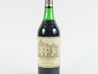 Vente aux enchères 1 BOUTEILLE CHÂTEAU HAUT BRION 1er GCC GRAVES - 1976 - 4 CM/ETLA